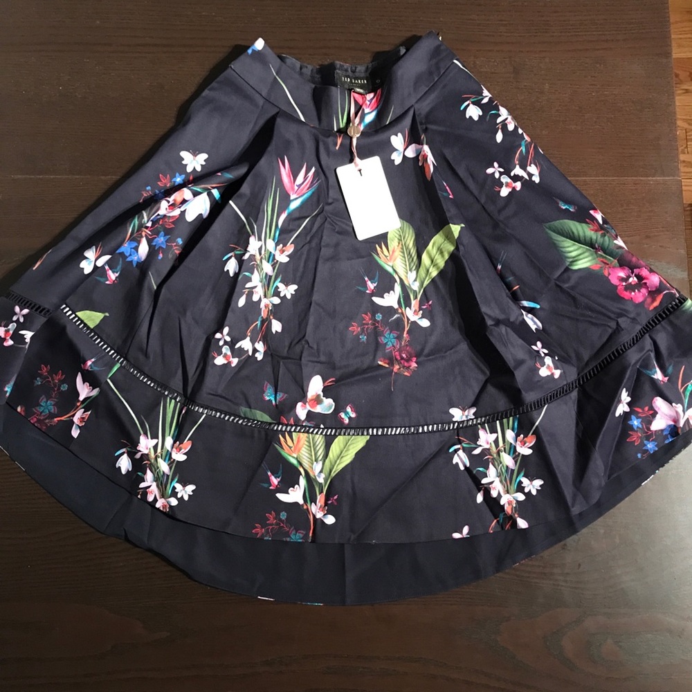 Plio Tropical Oasis Dip Hem Skirt
